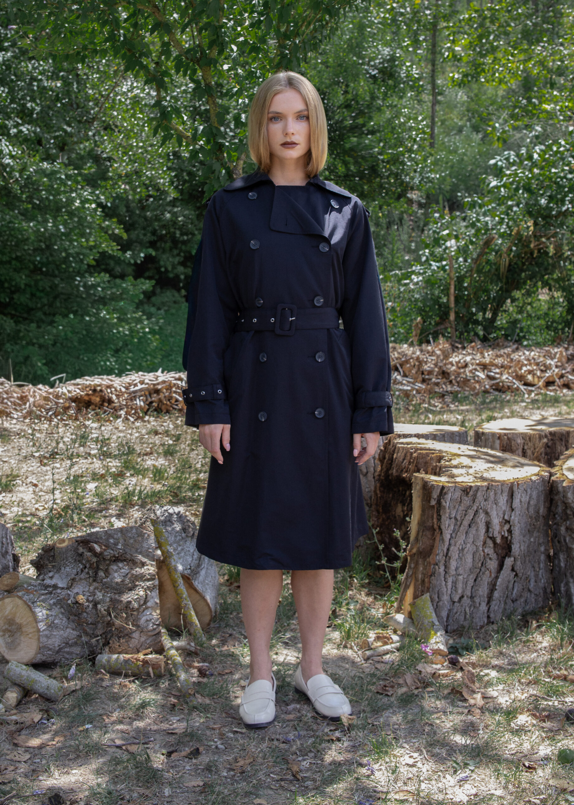 Oversized navy trench coat with belt, double-breasted closure, adjustable cuffs and two pockets — Fall Winter 25